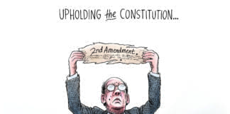 A caption across the top reads, "Upholding The Constitution." A Republican congressman, denoted by an Elephant button, wears a suit spattered with blood. He is holding only one scrap of the Constitution: The 2nd amendment.